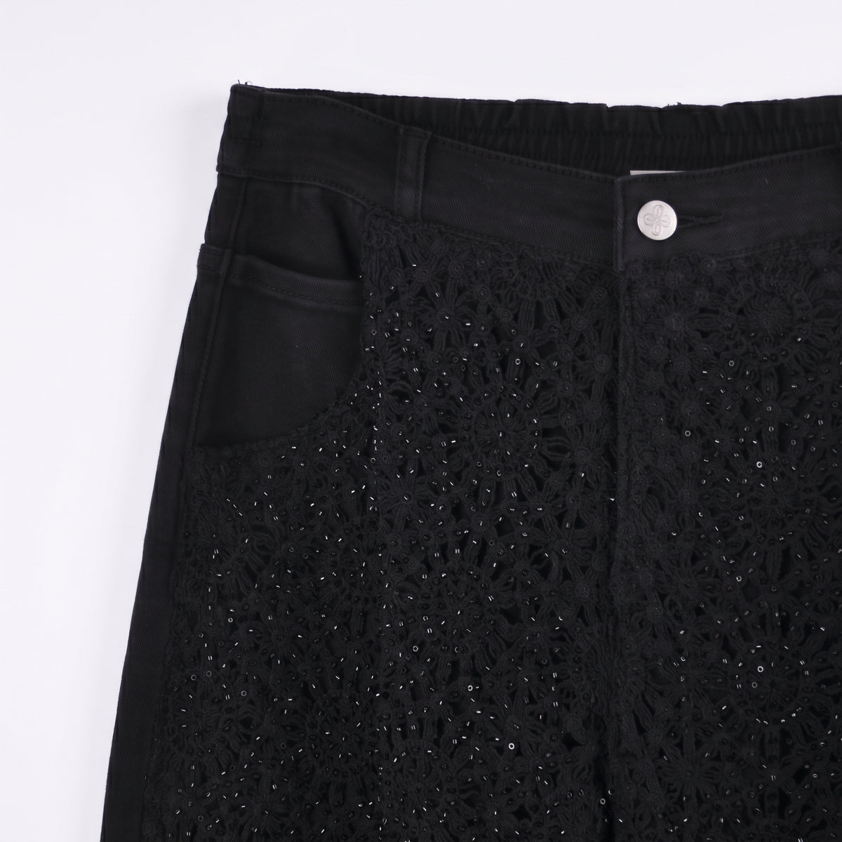 Jeans con ricami di perline