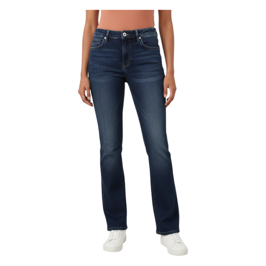 Jeans skinny blu scuro in denim elasticizzato Peg Fashion Store indossati da una modella con scarpe bianche