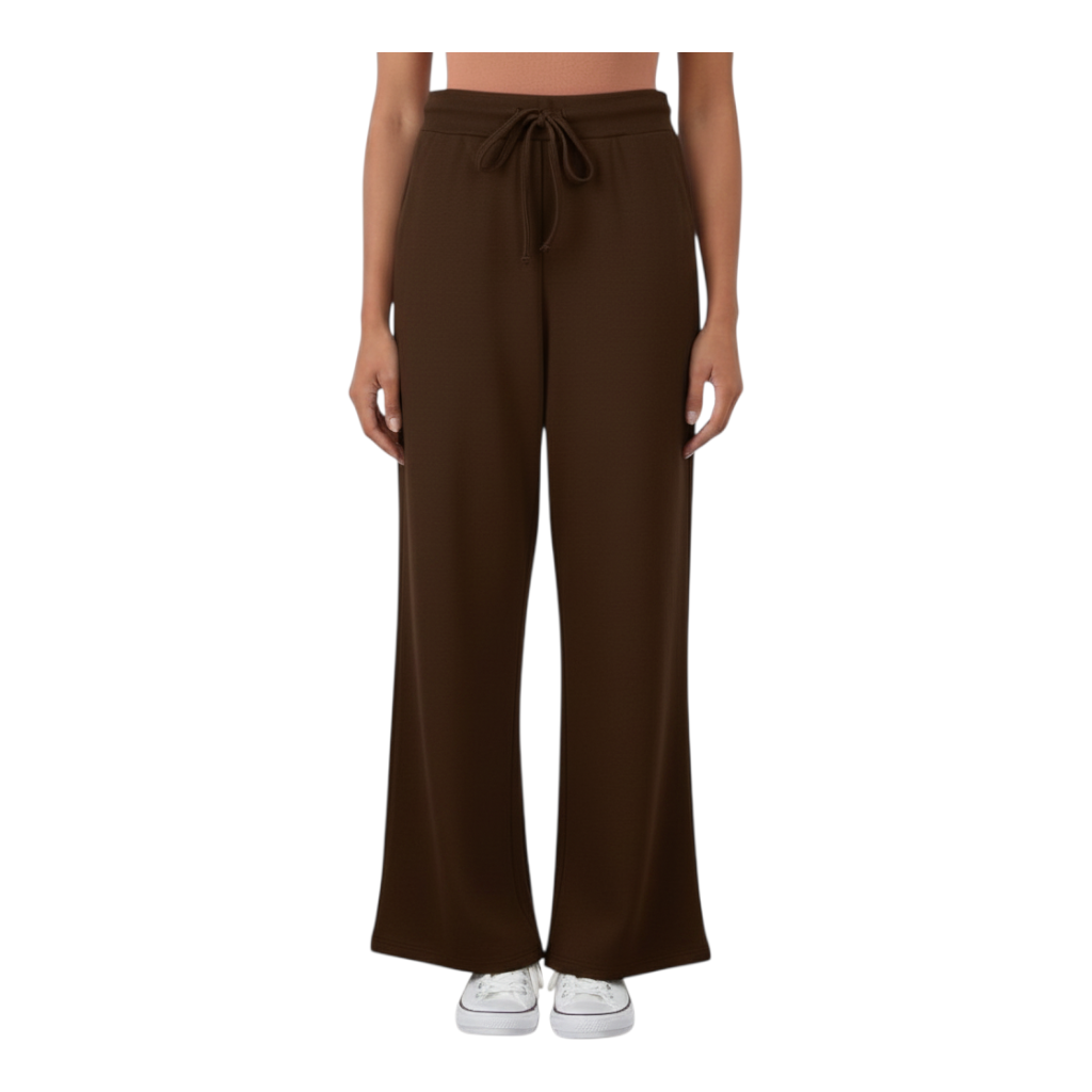 Modella indossa pantaloni Peg Fashion Store marroni a gamba larga con vita elasticizzata e coulisse