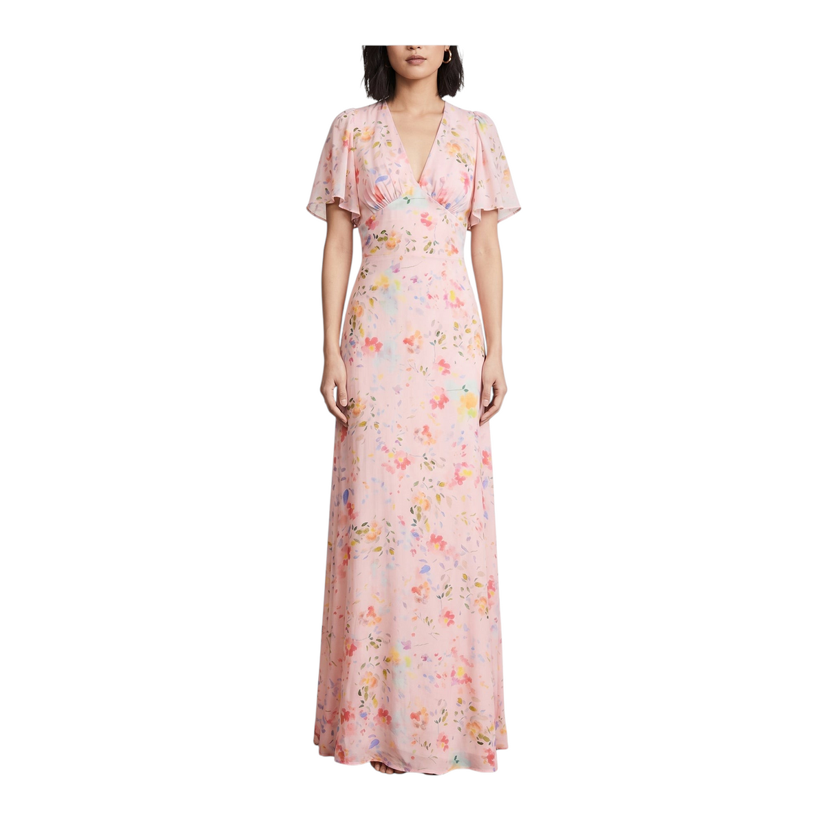 Modella indossa un abito lungo Peg Fashion Store rosa con stampa floreale, scollo a V e maniche a volant