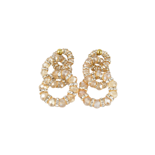 Orecchini a cerchio intrecciati Peg Fashion Store color champagne con cristalli luminosi e finitura dorata
