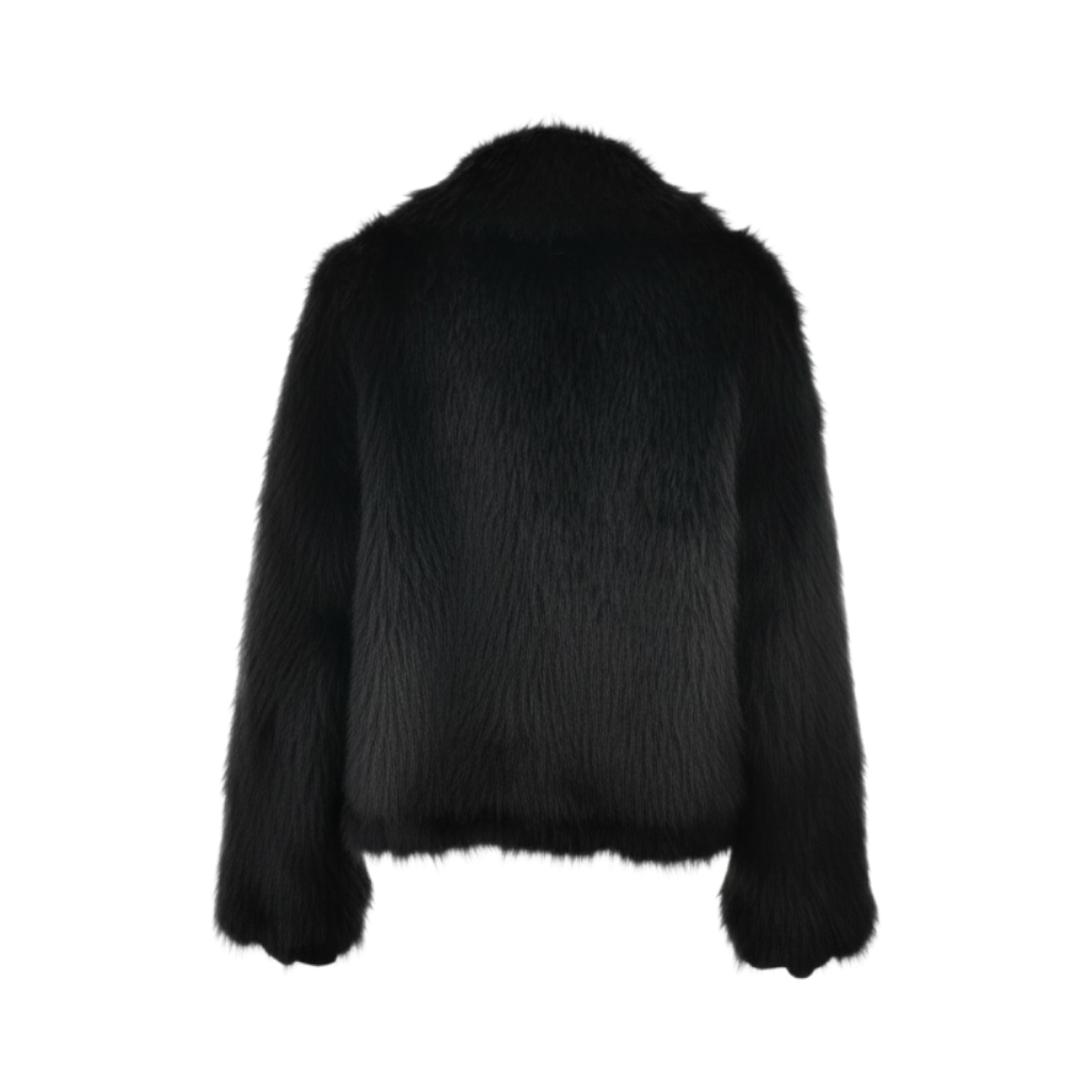 Giacca in ecopelliccia nera Peg Fashion Store con texture morbida e design elegante