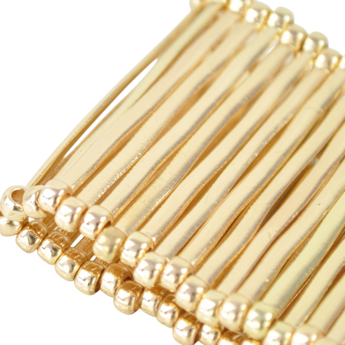 Bracciale elastico a fascia color oro con perline metalliche di Peg Fashion Store
